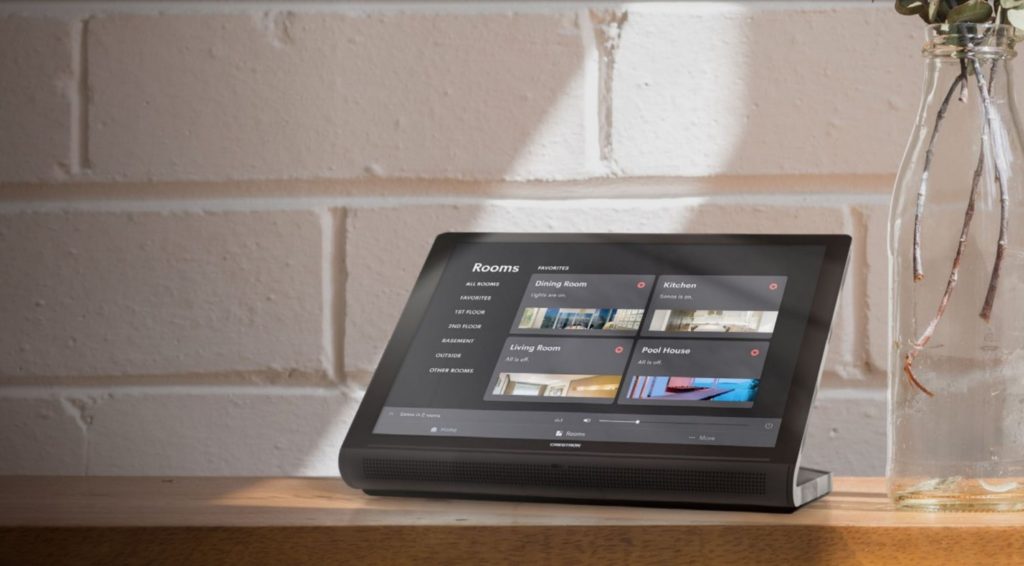 Wall-mounted control touchscreen in a contemporary living space