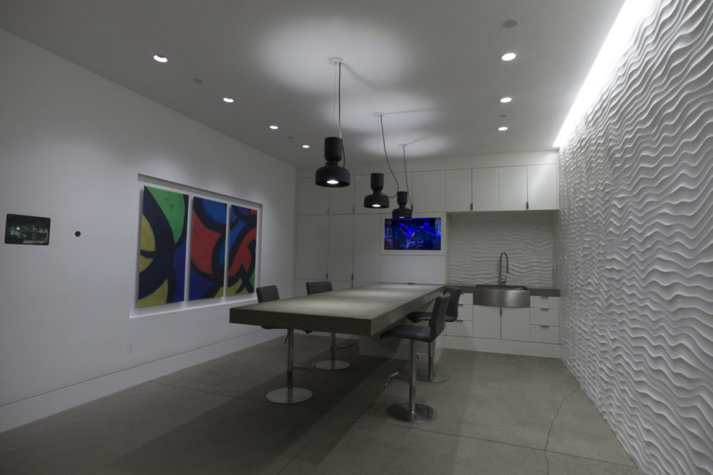 Elegant Ketra lighting system showcasing smart, customizable lighting solutions in the Pure Image Vancouver showroom.