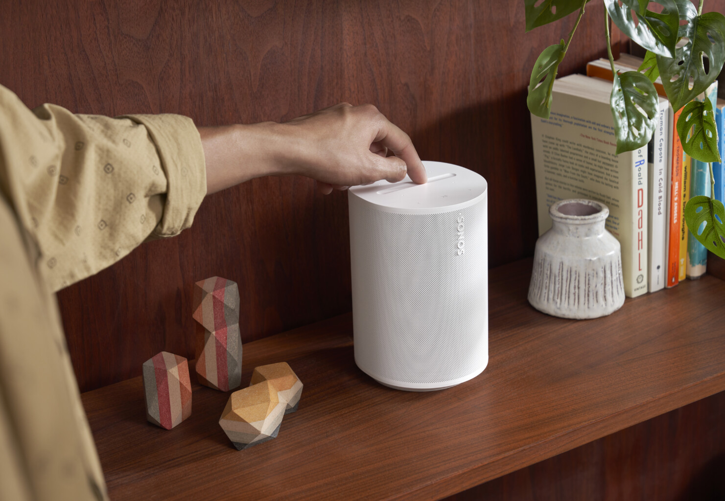 Sonos Era 100 speaker, offering high-quality audio and modern design for a smart home audio system