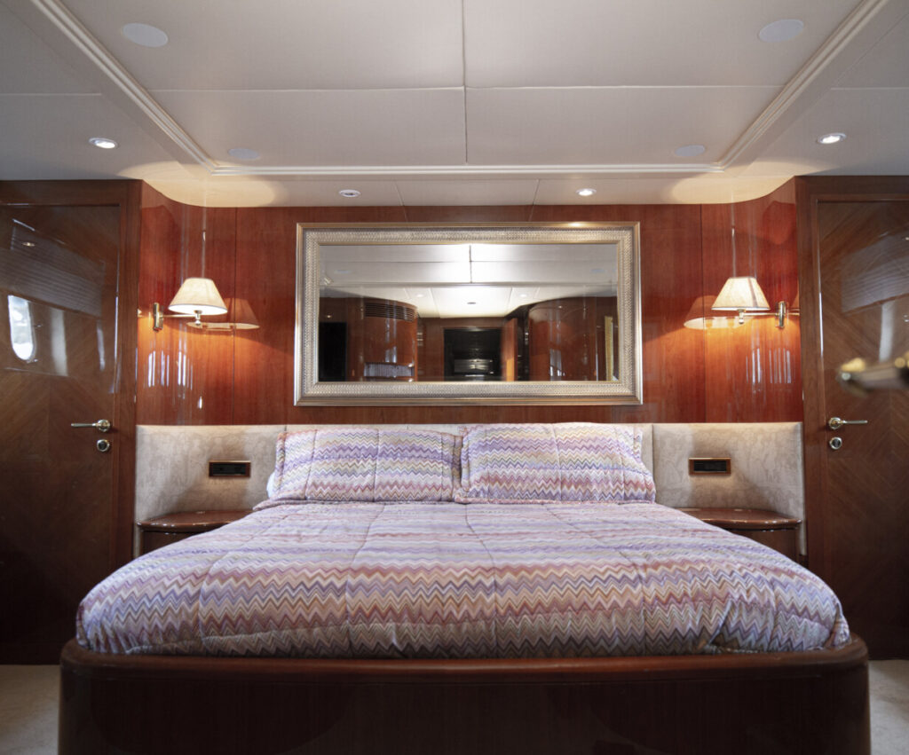 Owner's quarters on a superyacht featuring Lutron HomeWorks for advanced lighting and shading control