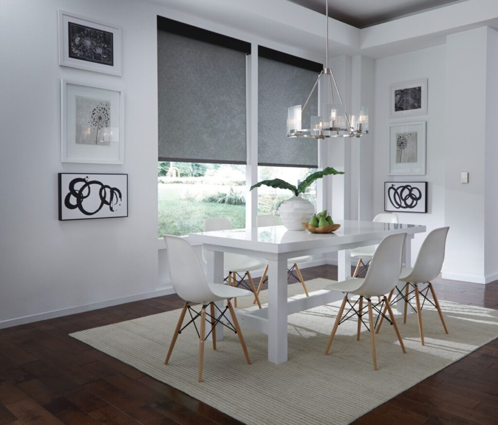 Lutron shades elegantly complement the sleek, modern design of this white-colored home, offering seamless integration with the home's smart automation system. Providing optimal light control, privacy, and energy efficiency, these shades enhance the minimalist aesthetic while offering a comfortable and sophisticated living environment.