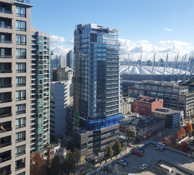 Custom automation system installation by Pure Image Technology for Boffo Developments’ luxury suites at The Smithe, Yaletown, Vancouver, showcasing collaboration with electrical and mechanical contractors to deliver high-end smart home solutions.