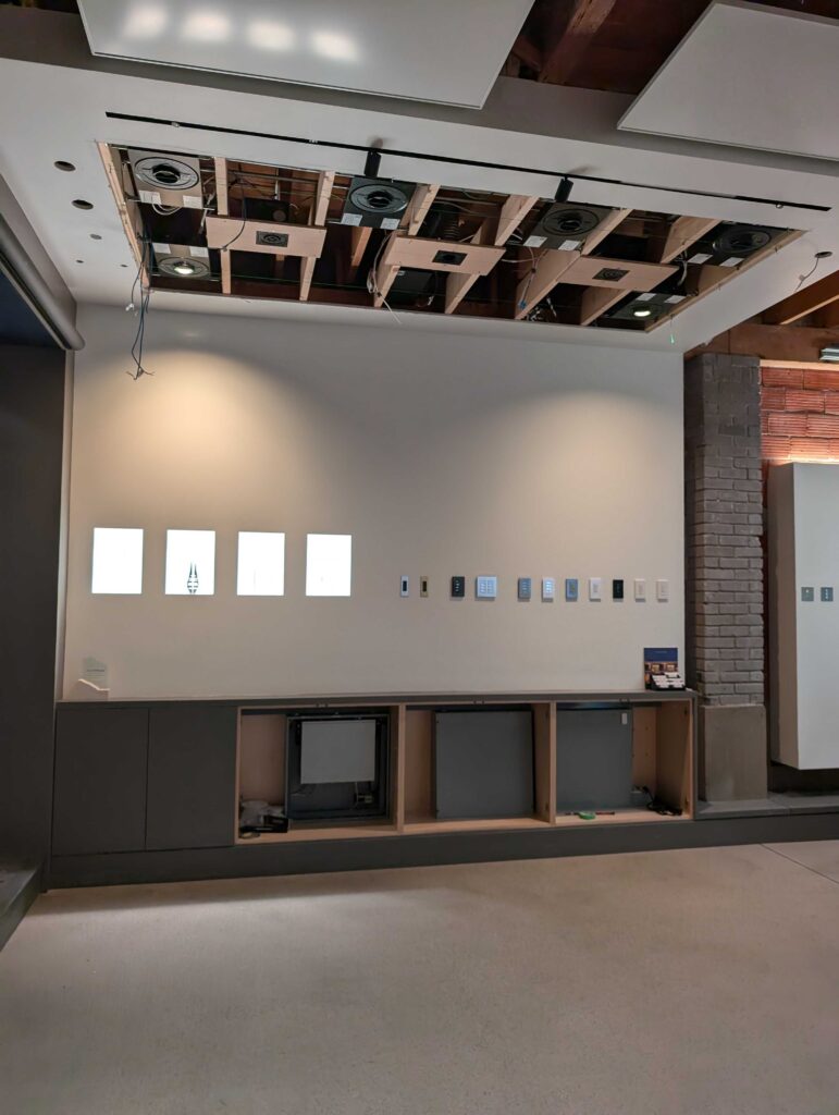 A behind-the-scenes look at the Pure Image Lutron showroom mid-renovation—ceiling panels removed as the team prepares to install cutting-edge Ketra and Rania D2 downlights. This work-in-progress captures the transformation toward a fully immersive, tunable lighting experience that blends design and innovation.
