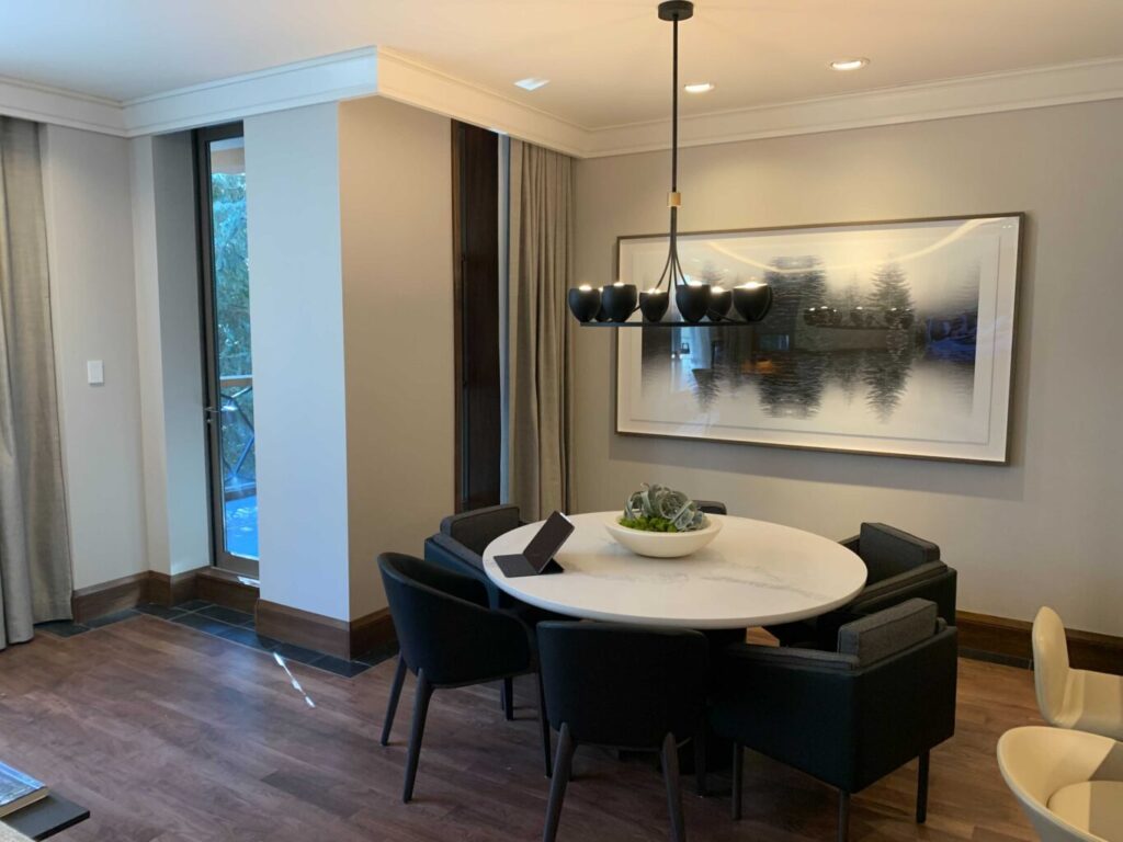 Luxury Four Seasons Whistler suite with Crestron smart lighting and automation installed by Pure Image as part of hospitality renovation.