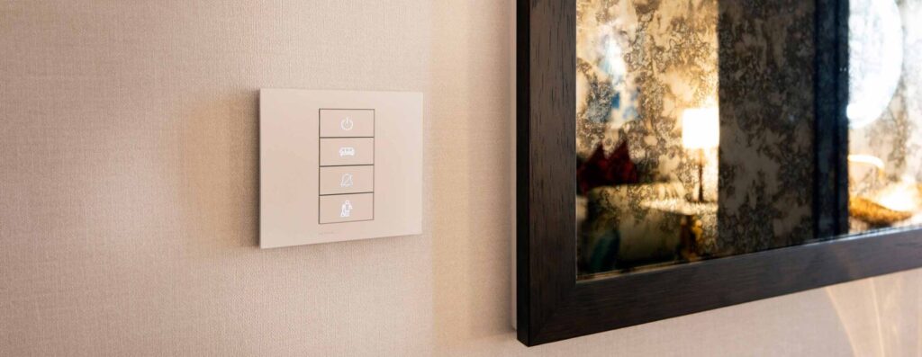 Palladiom keypads by Lutron provide luxury hotel guests with effortless control over lighting, shades, and ambiance.