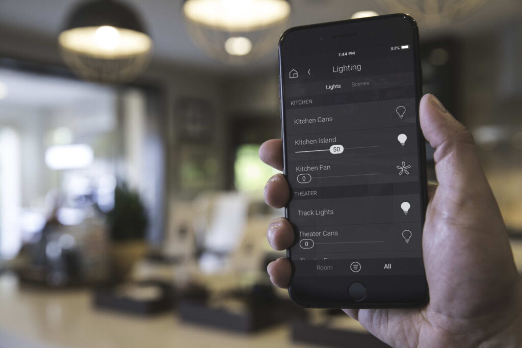 Control4 smart home app showing lighting control for kitchen and home theatre done by Pure Image in Whistler