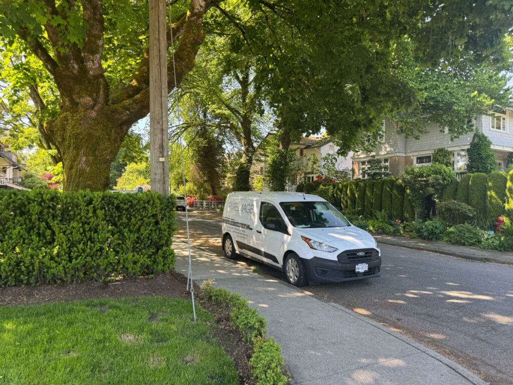 Pure Image smart home installation van parked outside a luxury character home — smart home automation and technology installation service in Victoria and Vancouver Island