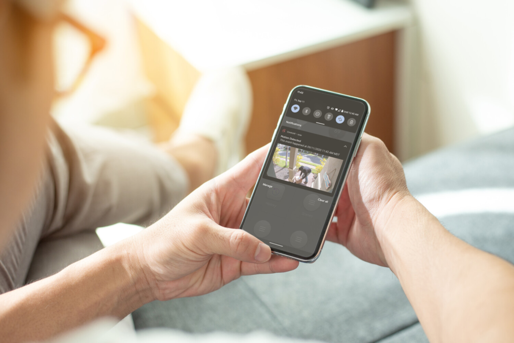 Control4 smart home security system app on phone showing security camera — home security control and smart home automation installation by Pure Image Vancouver BC