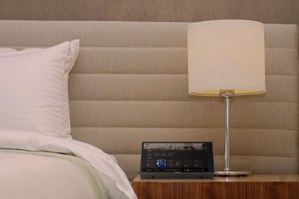 Crestron Tabletop touchscreen to control smart home lighting and audio on the bed side table - Crestron home automation installation by Pure Image Vancouver